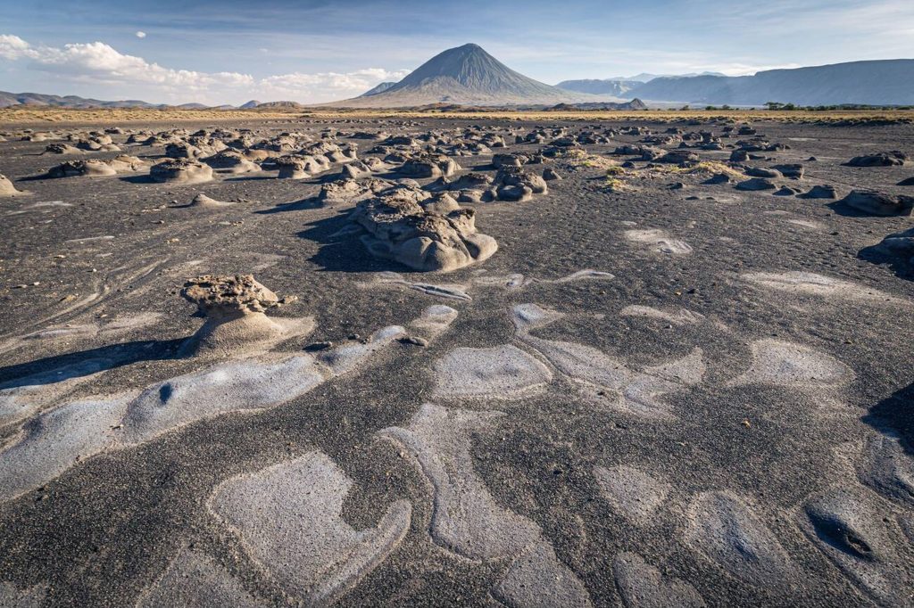 Mudflat and Ol Doinyo Lengai View From Lake Natron-Mateys Wild Tours